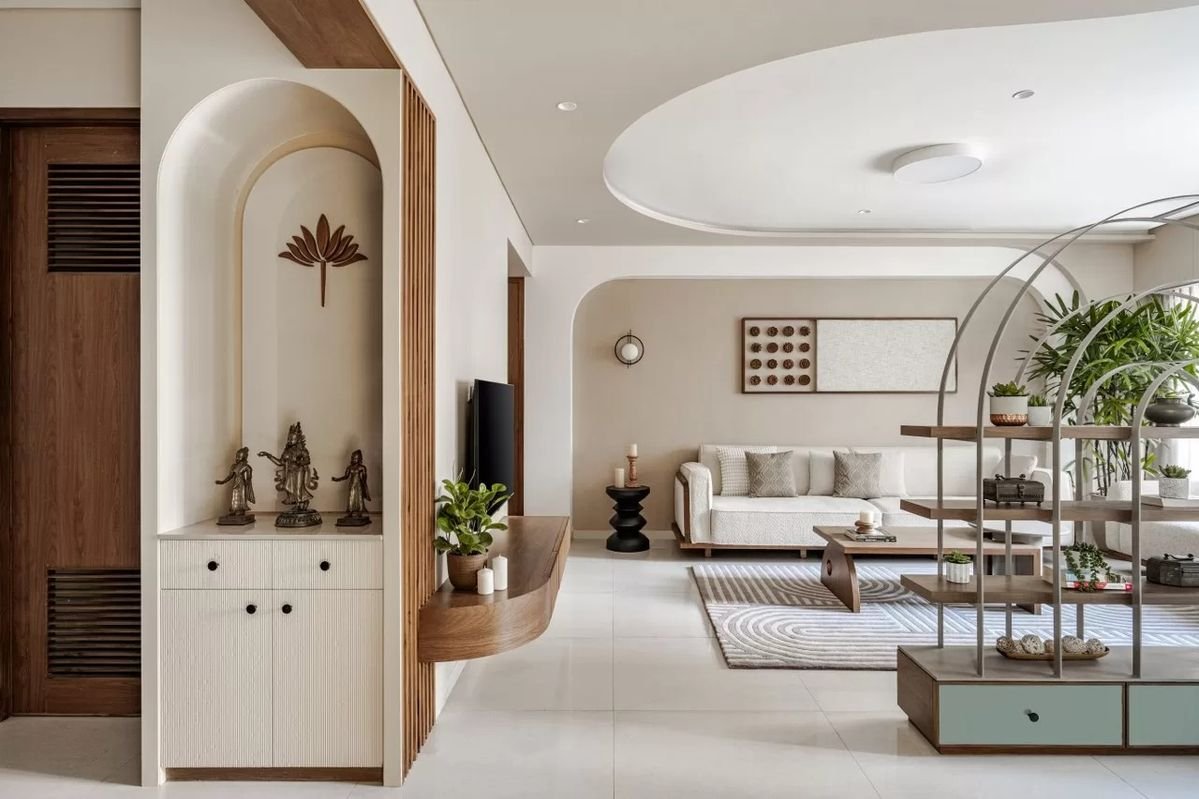 Living room interior with pooja unit and TV console design by Urban Design Interiors, interior design company in Bangalore